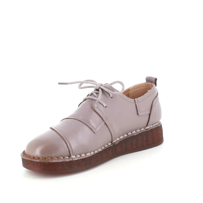 Beige skind snøresko med god stødabsorbering