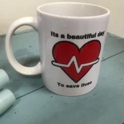 Krus med citat: Its a beautiful day to save lives