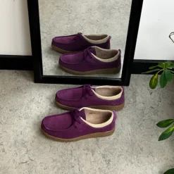 Lilla ruskindssko med rågummisål