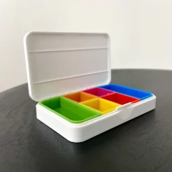 Pilleæske med huske app til telefonen.