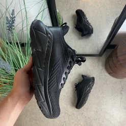 Sort komfortsko med stødabsorberende sål