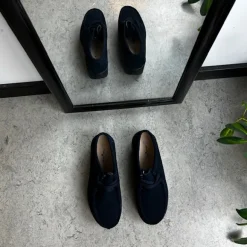 Sort ruskindssko med gængesål og svangstøtte