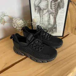 Sorte slip-on sko med strikoverdel